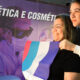 Aluna do curso de Estética e Cosmética da Unoeste orienta visitante durante feira de profissões, mostrando possibilidades da carreira na área da beleza e bem-estar.